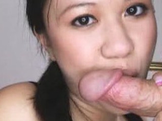 Carmina is an oriental slut out of gag reflex. This Babe takes a pecker all the way down her mouth and holds it for a whilst. Then Carmina gets her shaved twat fucked then the wang goes right back into her mouth. This Babe jerks off Thomas' knob until it