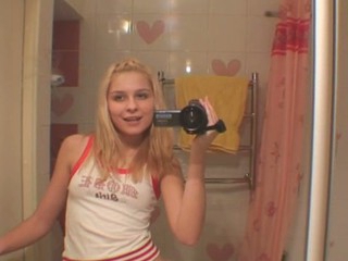 This awesome and pretty blonde is masturbating on the camera
